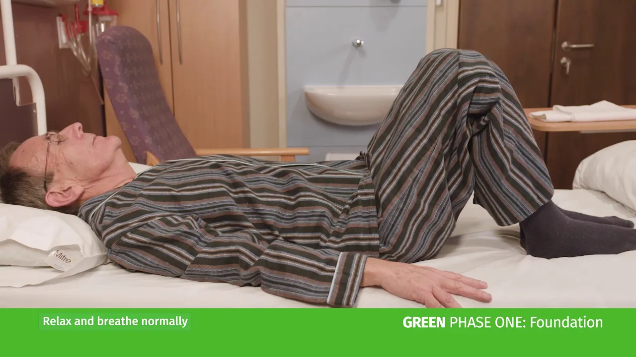 a person lying on a bed